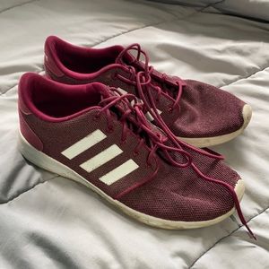 Maroon Adidas cloudfoam tennis shoes.